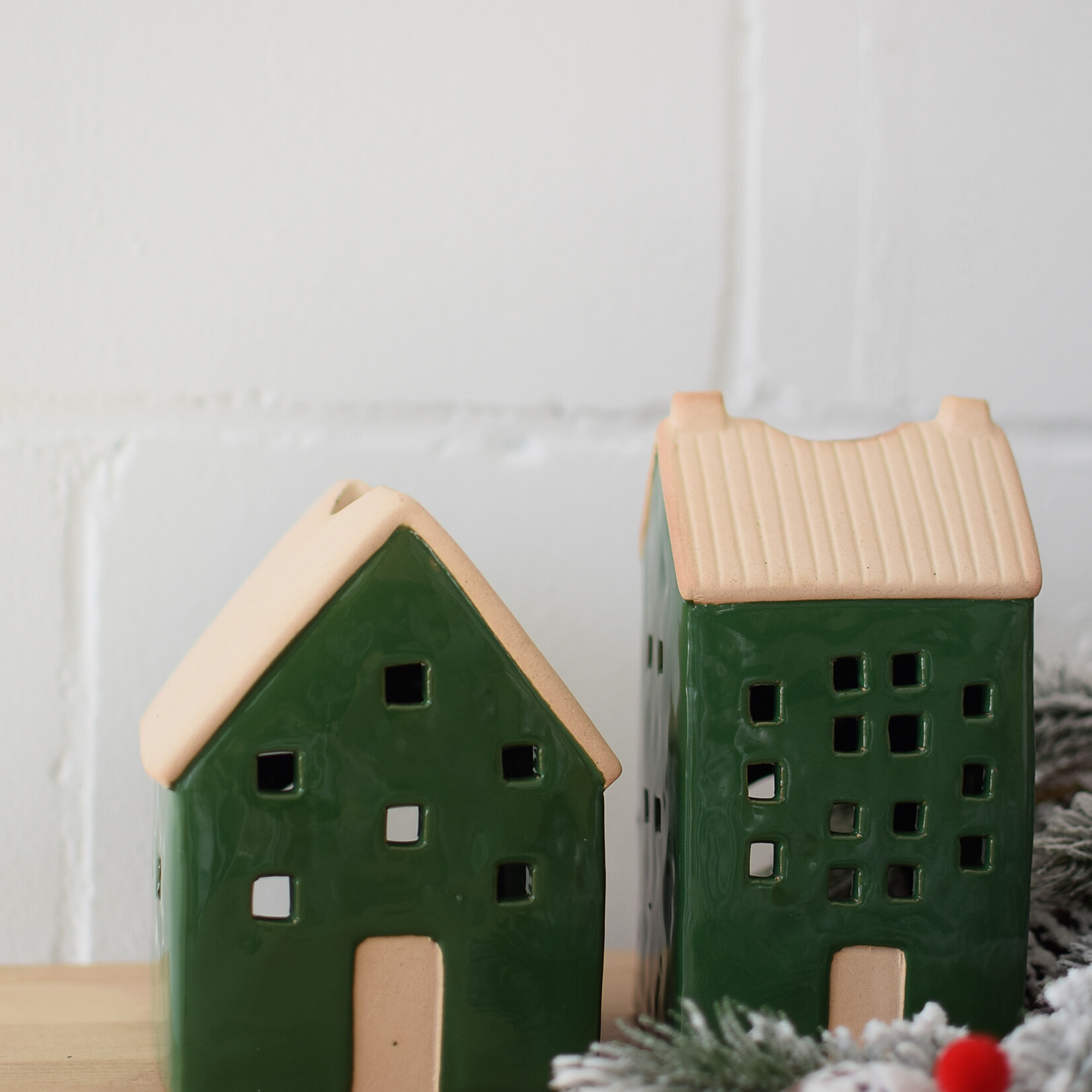 Green and beige house candle jar