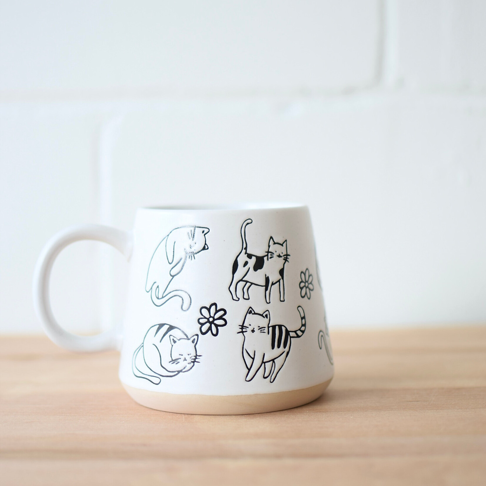 Playful cats mug