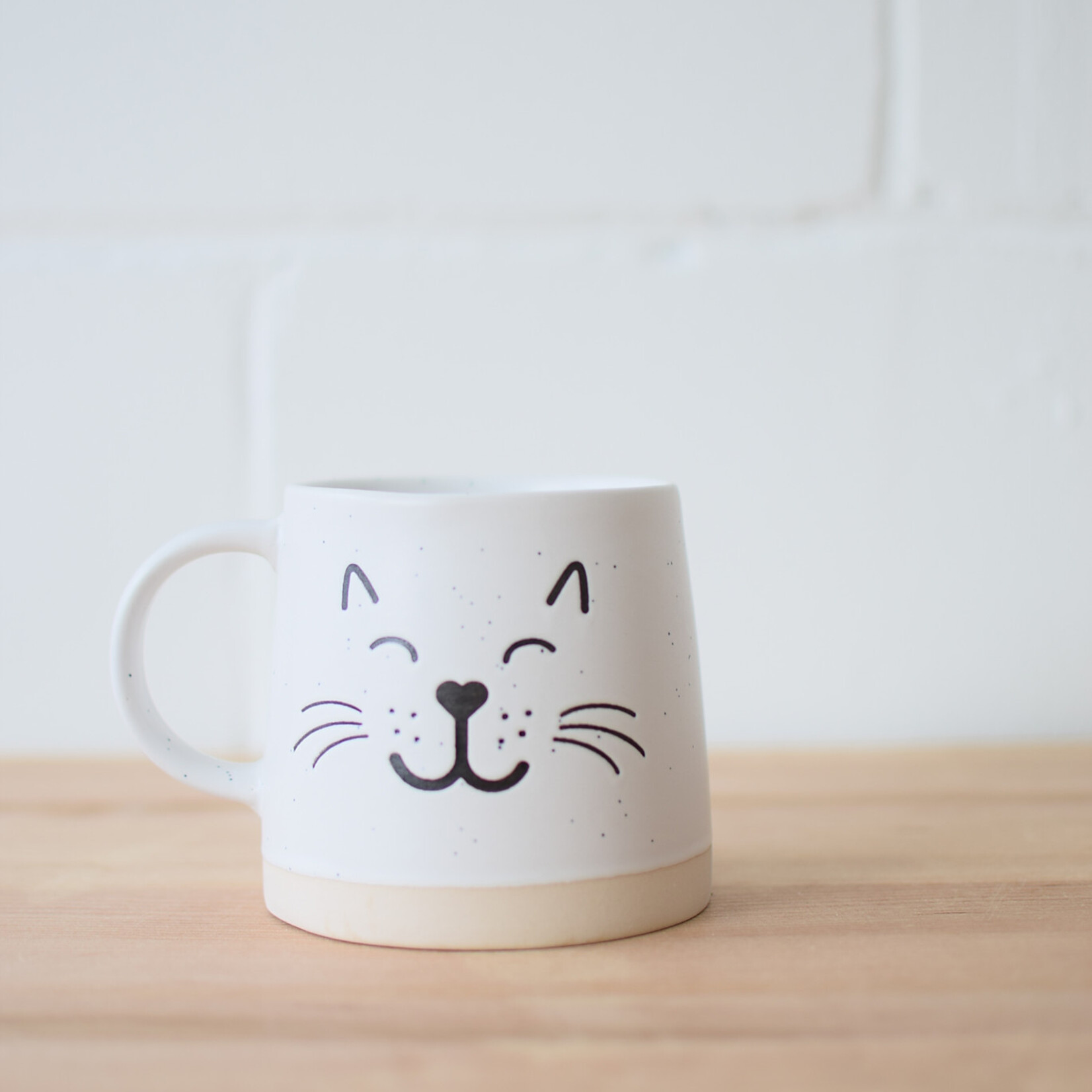 Smiling cat mug