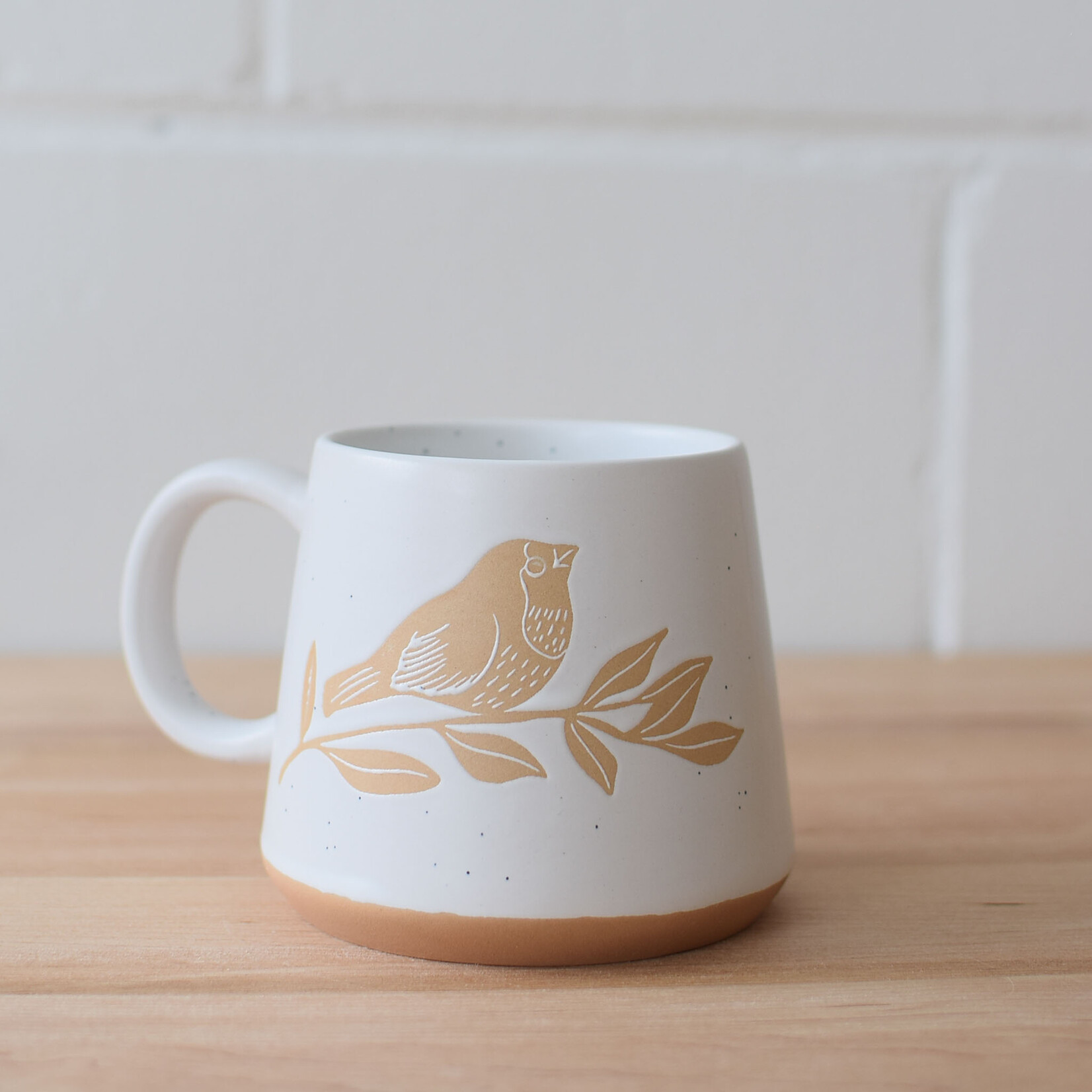 Bird on branch mug