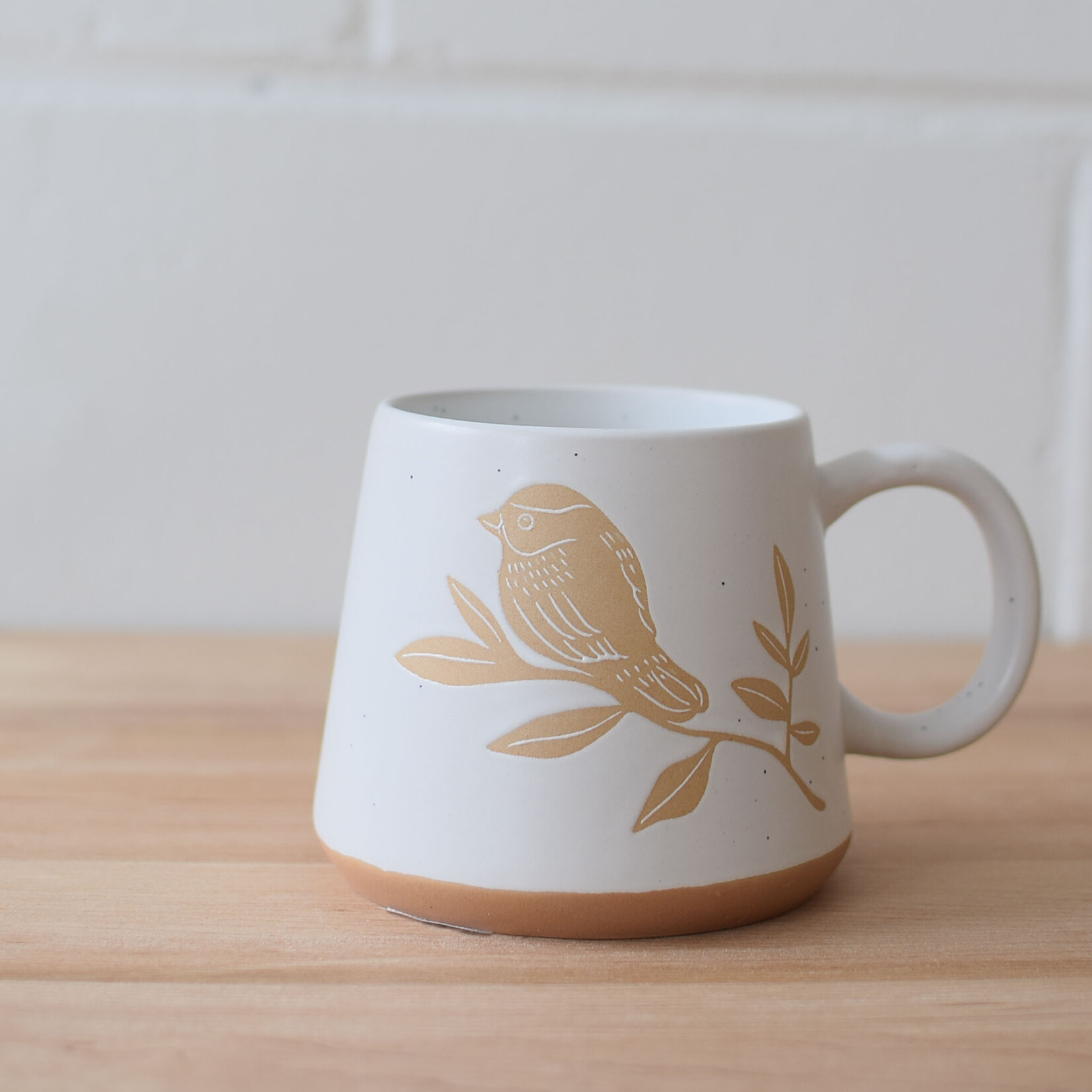 Bird on branch mug