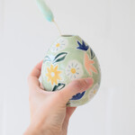 Vase fleuri vert