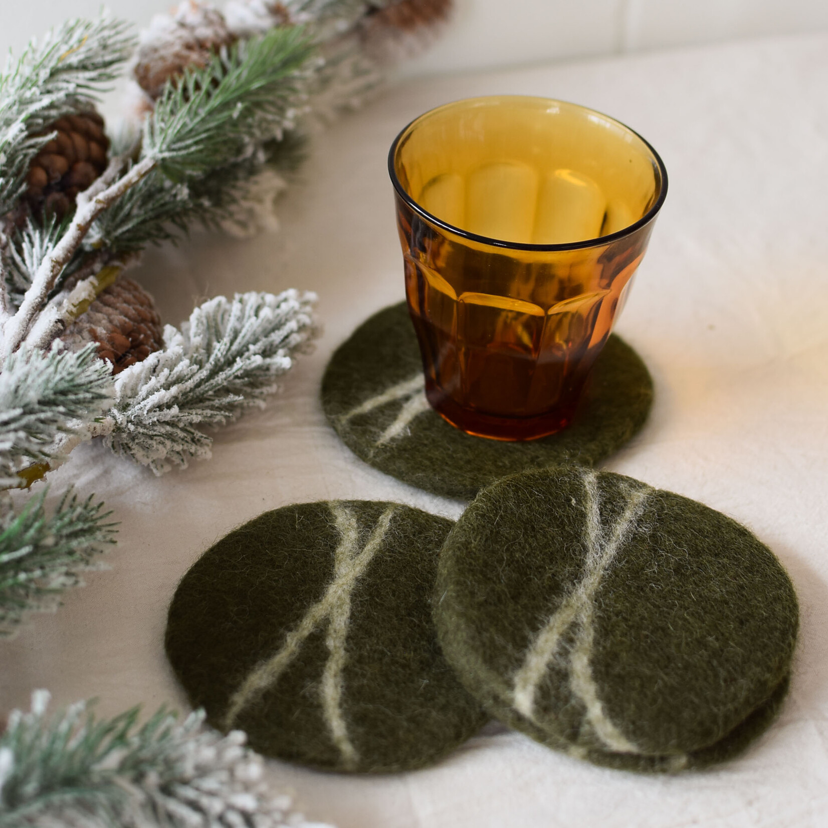 Wool coasters (4) shaped like pebbles