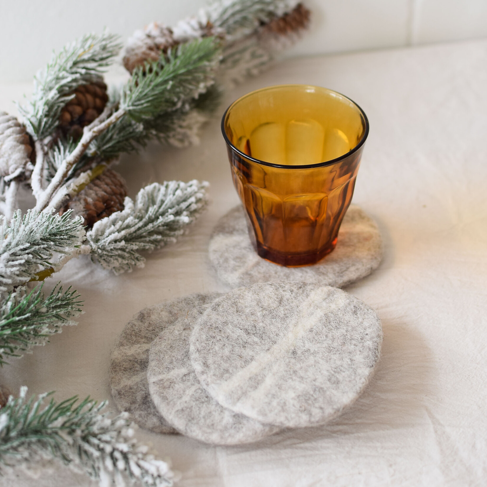 Wool coasters (4) shaped like pebbles