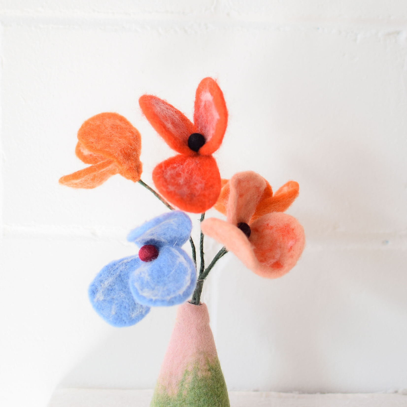 Fleur en laine coquelicot