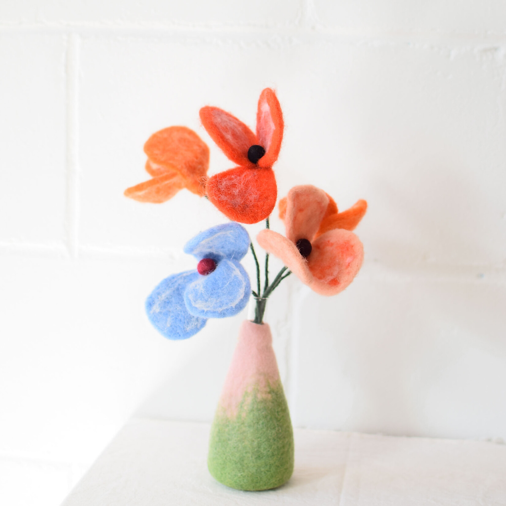 Fleur en laine coquelicot