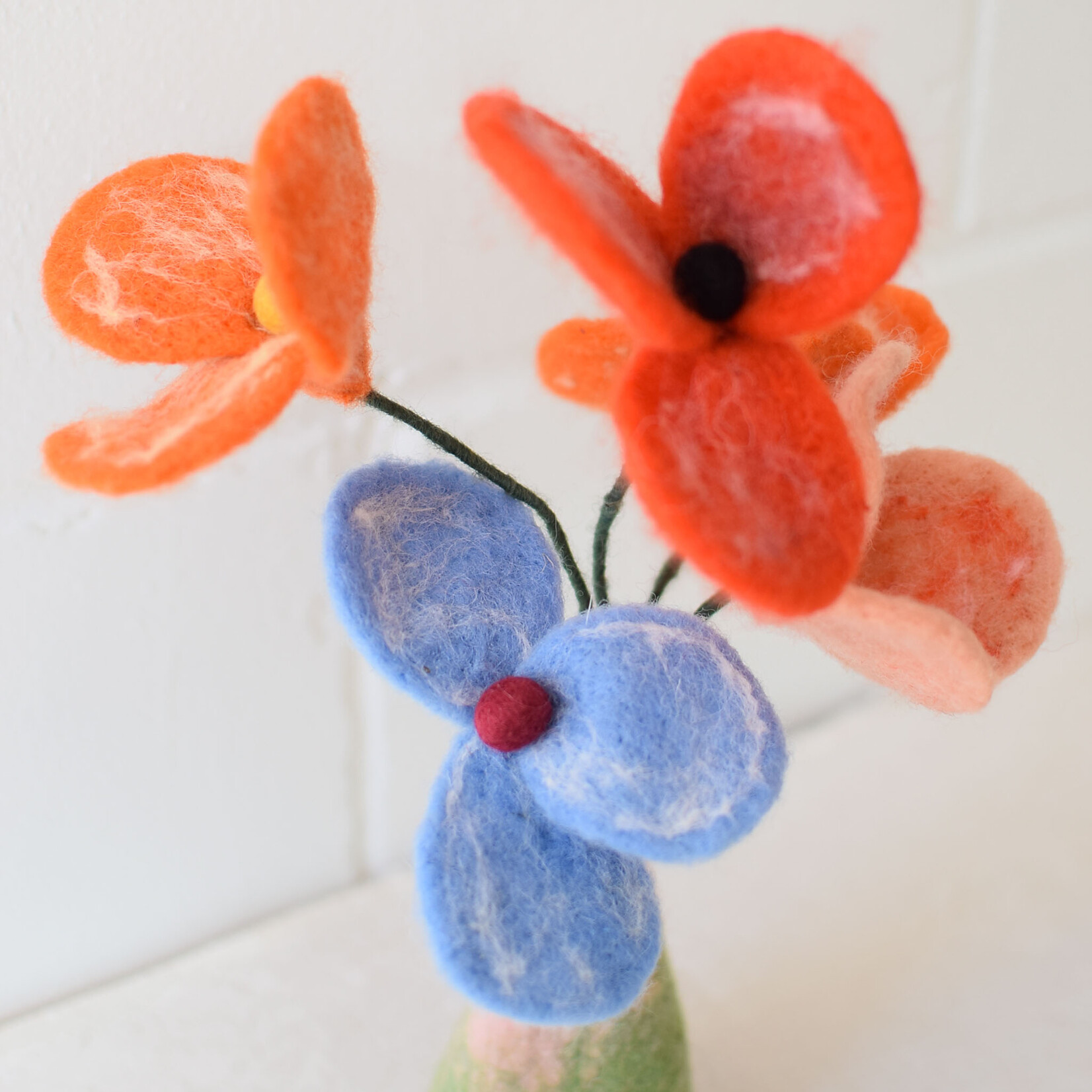 Fleur en laine coquelicot