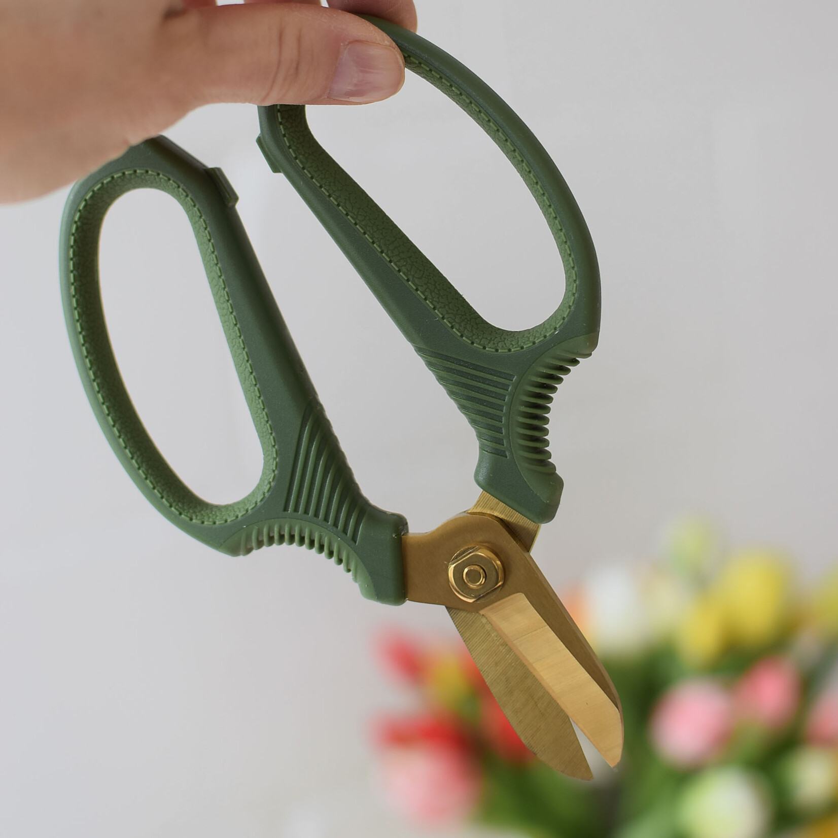 Green and gold secateurs