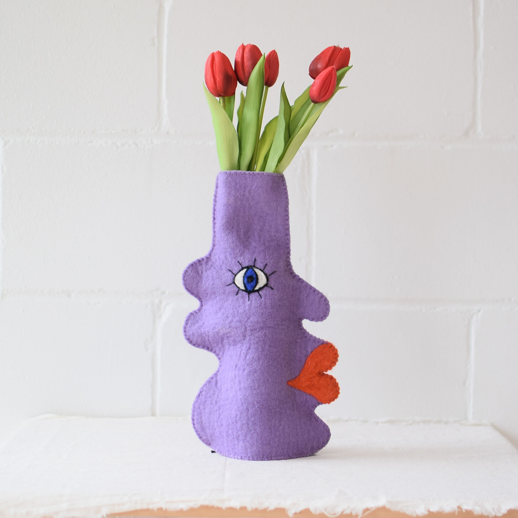 Couvre bouteille en laine Visage - Lilas