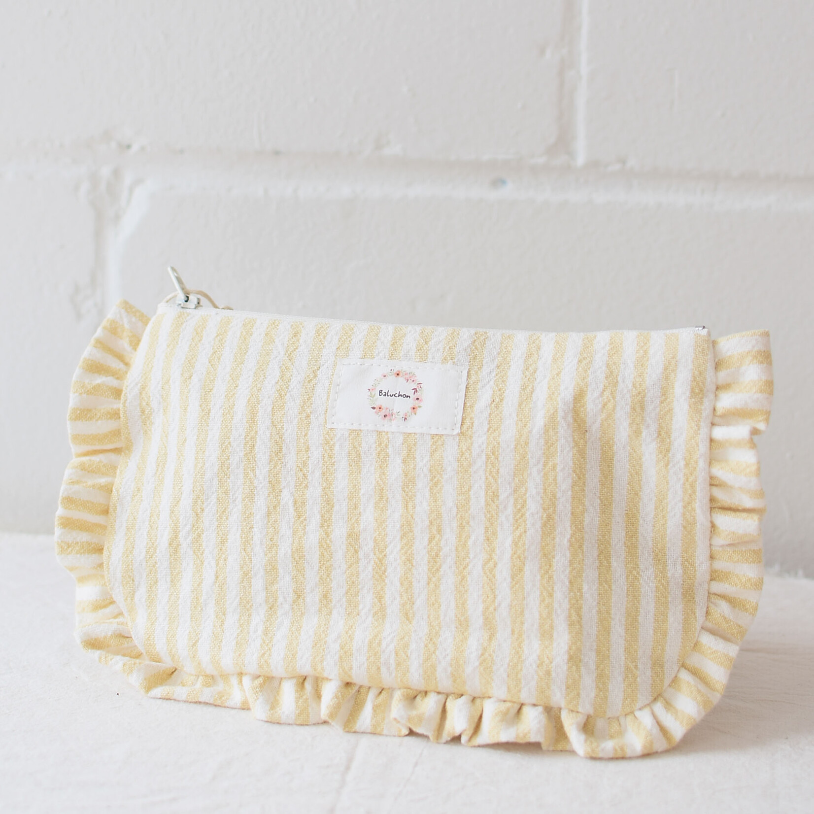 Pochette à volant