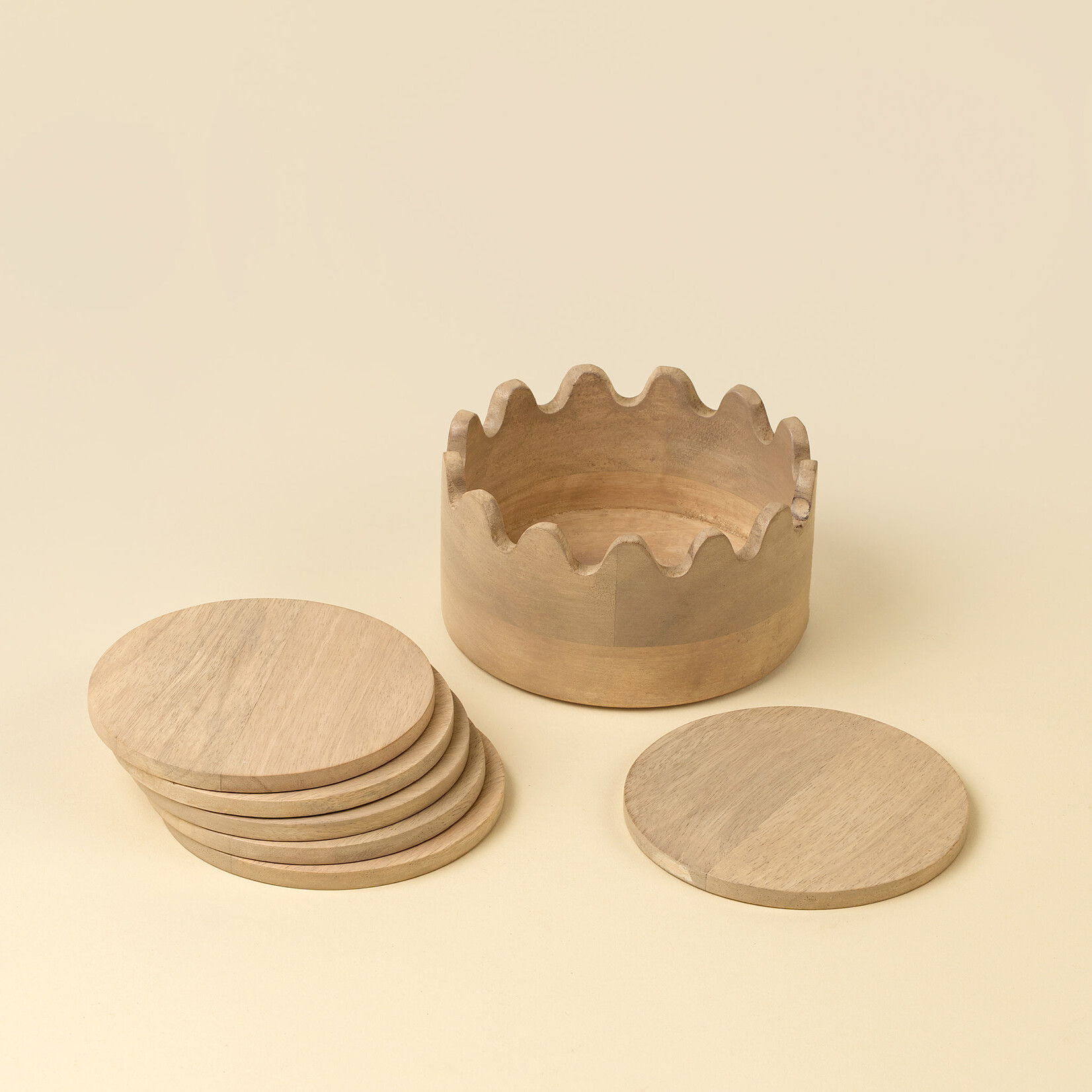 Sous-verres dans un coffret festonné