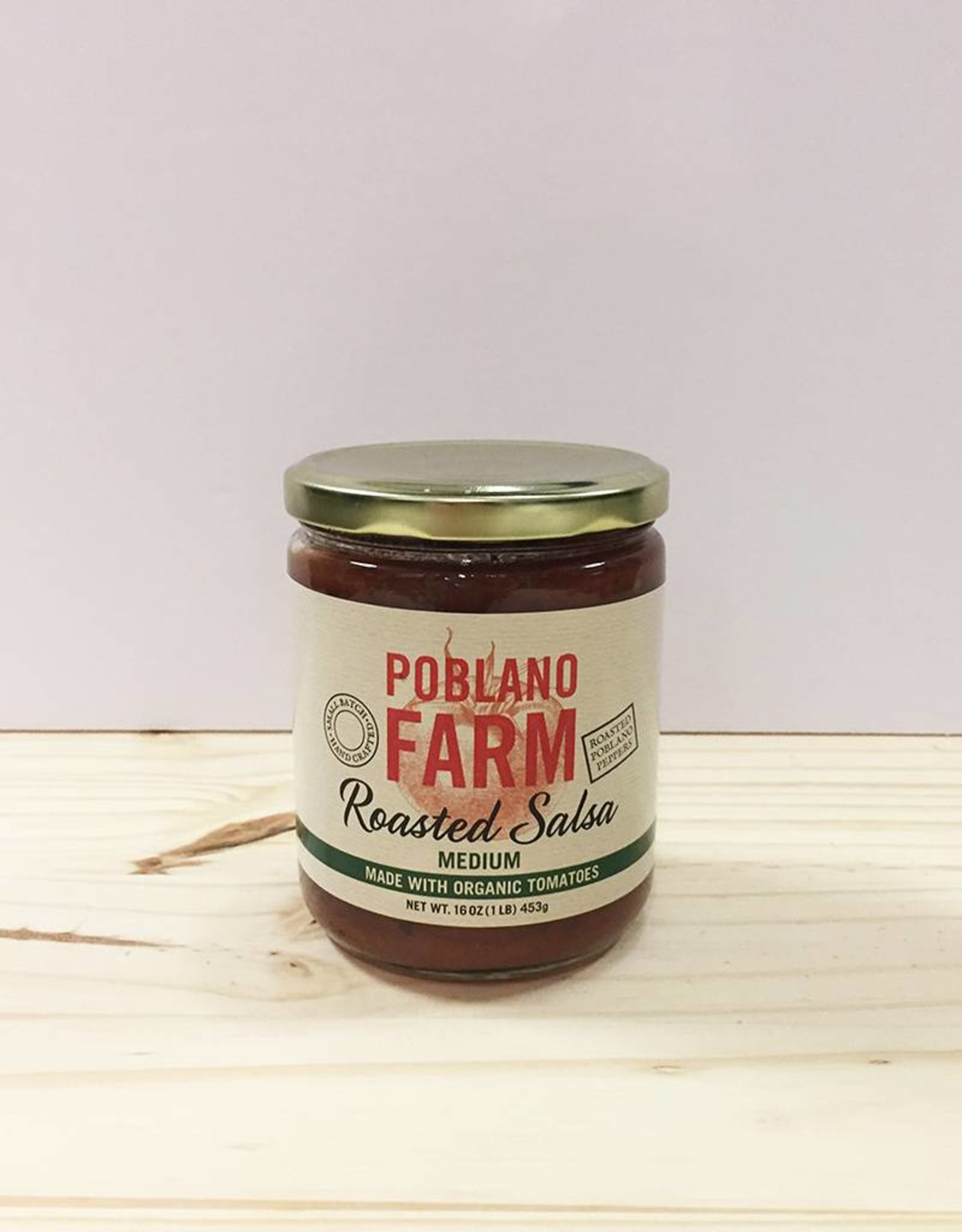 https://cdn.shoplightspeed.com/shops/622063/files/11331730/1600x2048x2/poblano-farm-poblano-farm-roasted-tomato-salsa-med.jpg