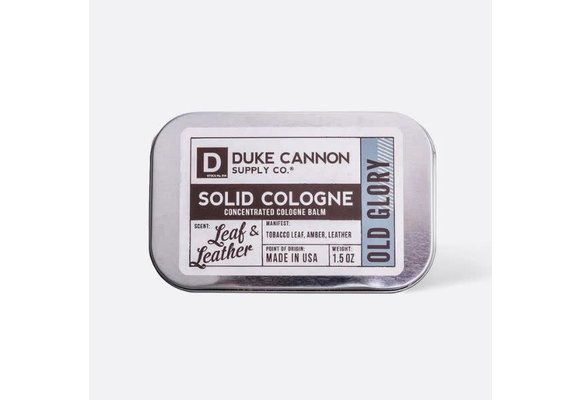 https://cdn.shoplightspeed.com/shops/622160/files/52683290/580x400x2/duke-cannon-solid-cologne-old-glory.jpg