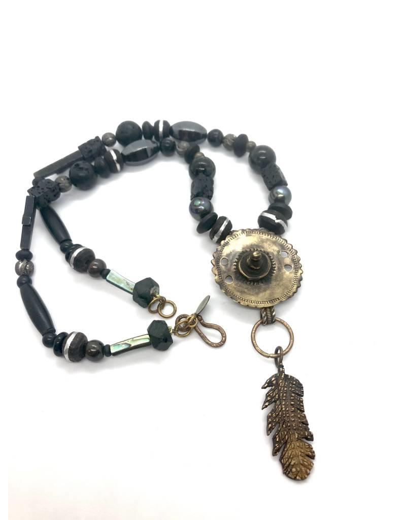 Bronze feather/disc on black beaded chain