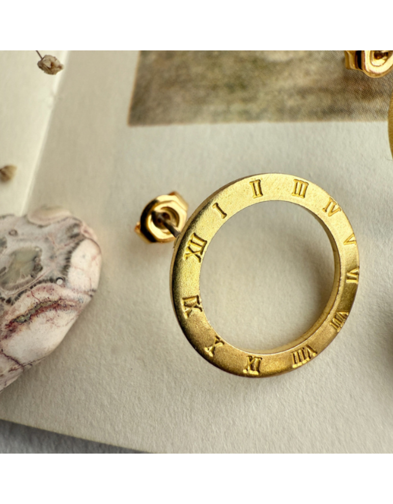 Pika & Bear Samsara Roman Numerals Circle Studs in Raw Brass by Pika & Bear