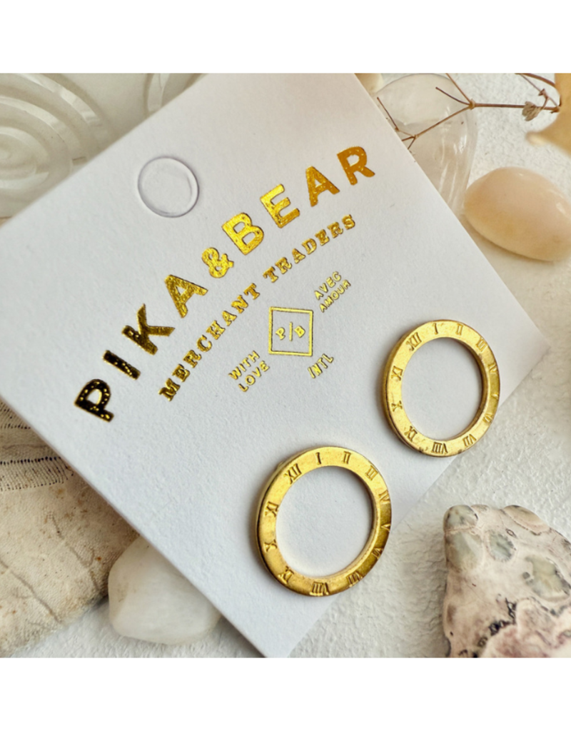 Pika & Bear Samsara Roman Numerals Circle Studs in Raw Brass by Pika & Bear
