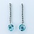Earrings .10ctw Round Diamonds 9.5ctw Topaz 14kw 41x10mm 222100082