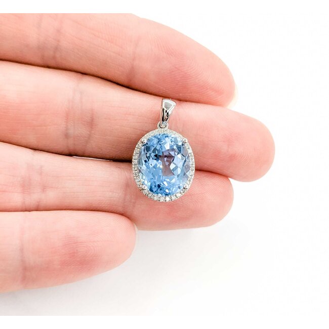 Pendant .11ctw Round Diamonds 6.51ct Blue Topaz 20x12mm 14kw " 124091250