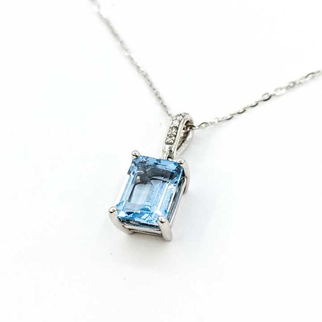 Pendant Accented .04ctw Round Diamonds 3ct Sky Blue Topaz 14kw .75x.3" 16-22" Adjustable 3.63g 125100013