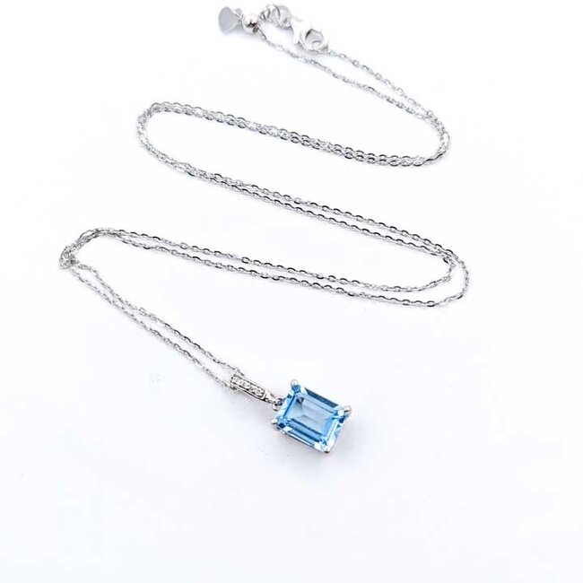 Pendant Accented .04ctw Round Diamonds 3ct Sky Blue Topaz 14kw .75x.3" 16-22" Adjustable 3.63g 125100013