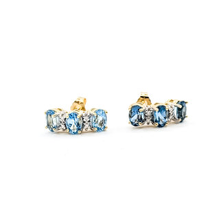 Earrings Stud 3-Stone .04ctw Round Diamonds 2.00ctw London Blue Topaz 14ky 16x6mm 3.43g 125110143