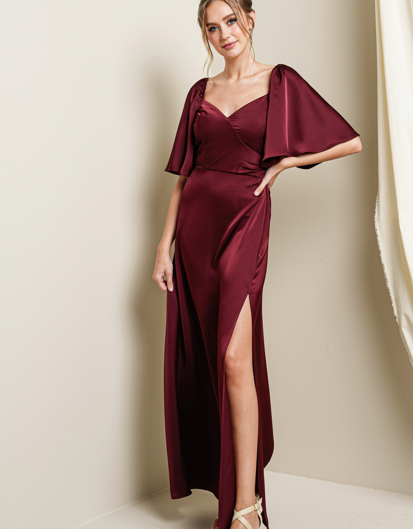 HUSH FIORELLA satin flutter sleeve gown