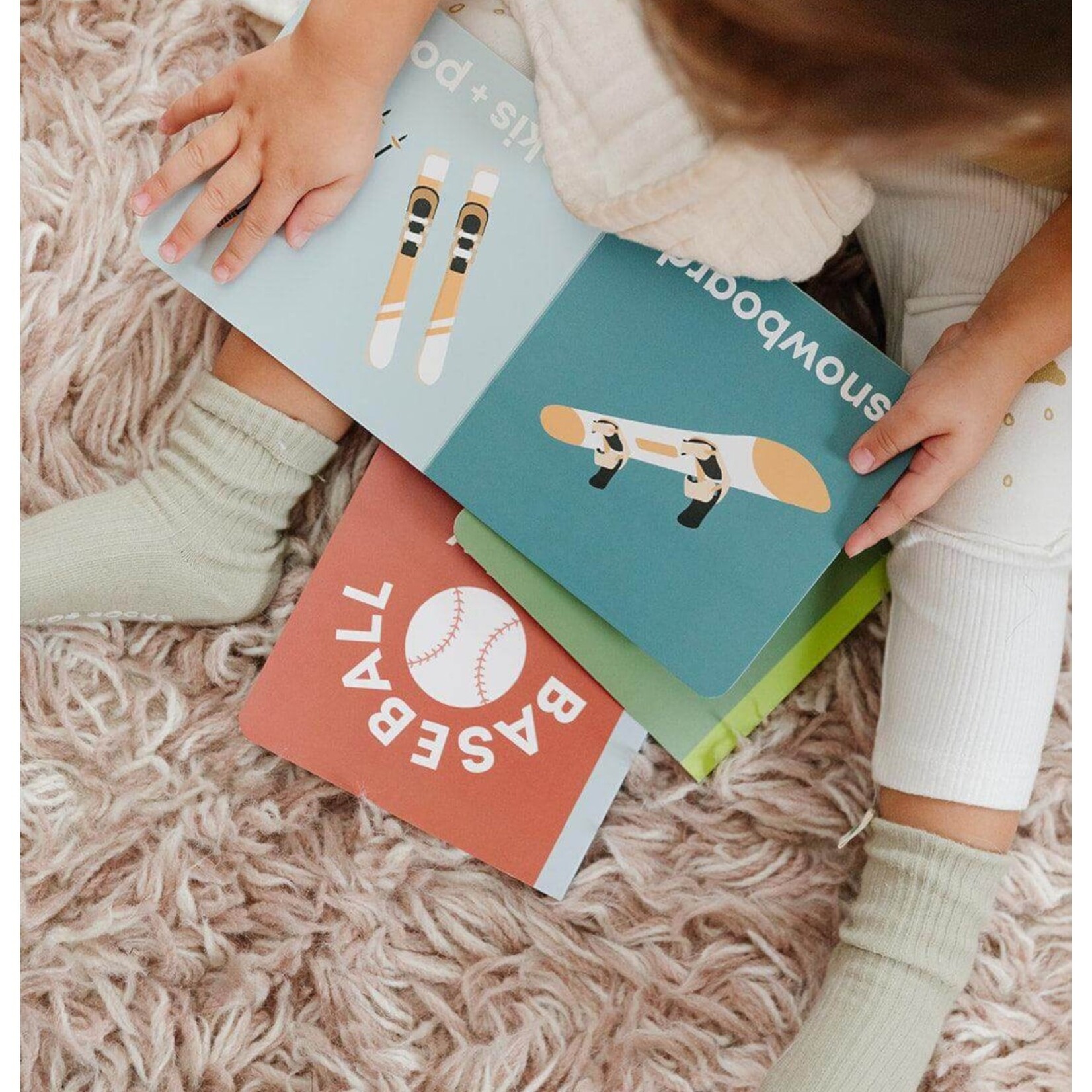 Left Hand Book House Snow Baby Book