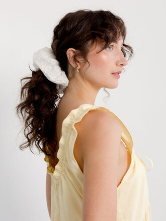 A Bronze Age Large scrunchie . White eyelet A Bronze Age Large scrunchie . White eyelet