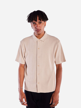 Olow Cheech organic cotton polo . Cream Olow Cheech organic cotton polo . Cream
