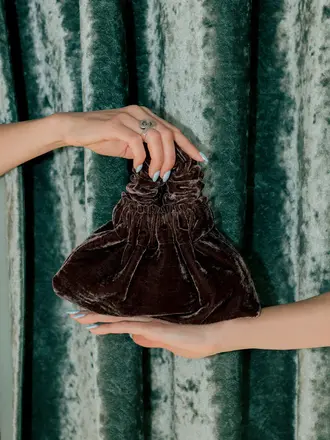 A Bronze Age Halo Velvet Bag . Eclipse