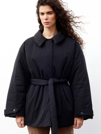 Black to grey Circle padded jacket . Black