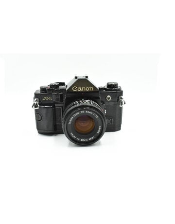 Canon Pre-Owned Canon A-1 W/50mm F1.8 FD Lens 35mm Film Camera Black Canon Pre-Owned Canon A-1 W/50mm F1.8 FD Lens 35mm Film Camera Black