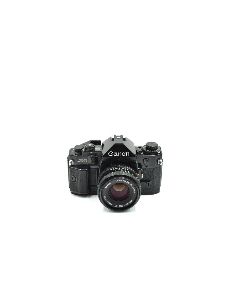 Canon Pre-owned Canon A-1 Black Body w/ 50mm F1.8 FD  (35mm Film Camera)
