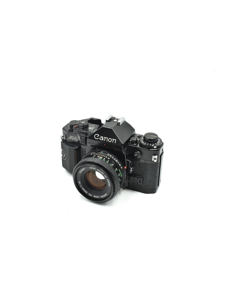 Canon Pre-owned Canon A-1 Black Body w/ 50mm F1.8 FD  (35mm Film Camera)