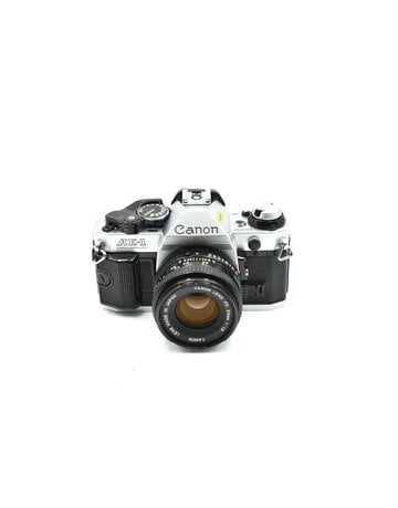 Canon Pre-Owned Canon AE- 1 Program W/ 50mm F1.8 FD lens , Silver (35mm Film Camera)