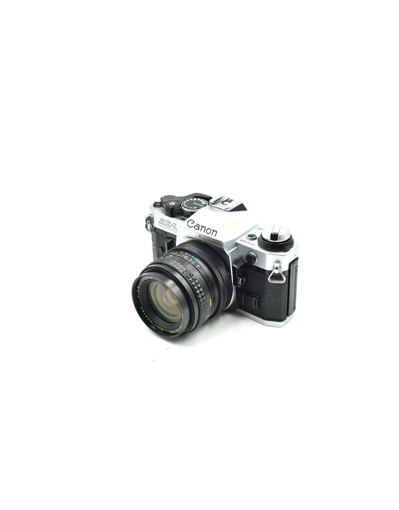 Canon Consign -  Canon AE-1 Pro W/ 28mm F2.8 FD Lens (35mm Film Camera)