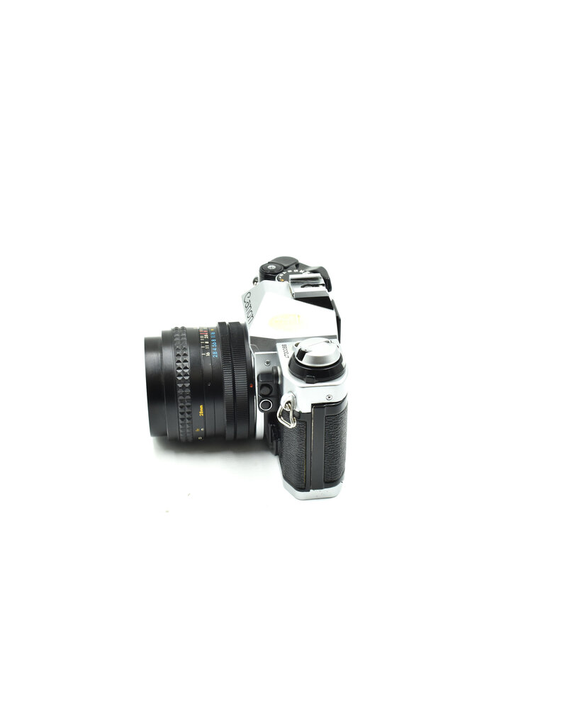 Canon Consign -  Canon AE-1 Pro W/ 28mm F2.8 FD Lens (35mm Film Camera)