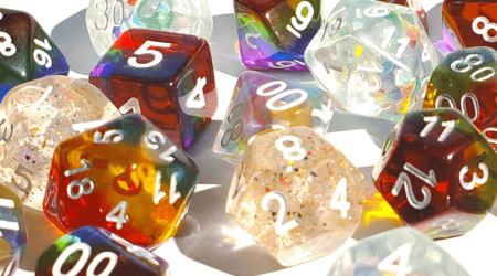 Various rainbow-coloured dice