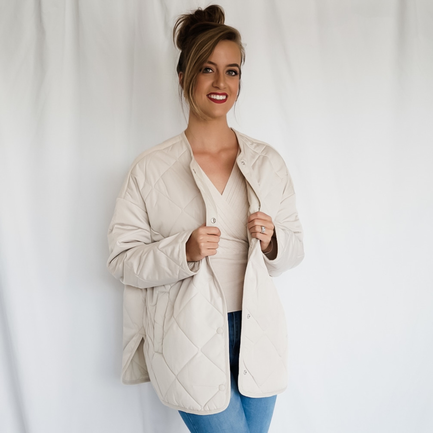 Apricot collarless quilted jacket
