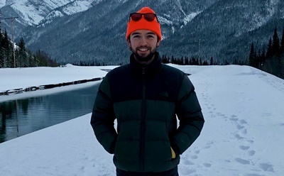 Ben outside in the mountains in snow