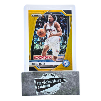 The Adventure Stadium 2024-25 Panini Prizm Monopoly Tyrese Maxey Gold 34/49