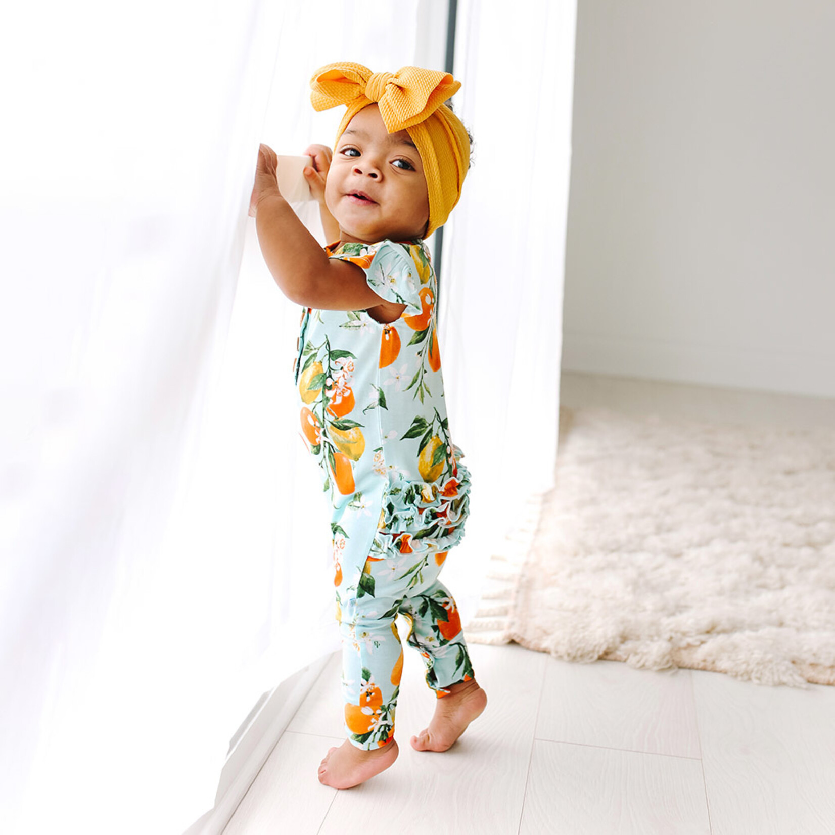 Posh Peanut Mirabella - Ruffled Capsleeve Henley Romper