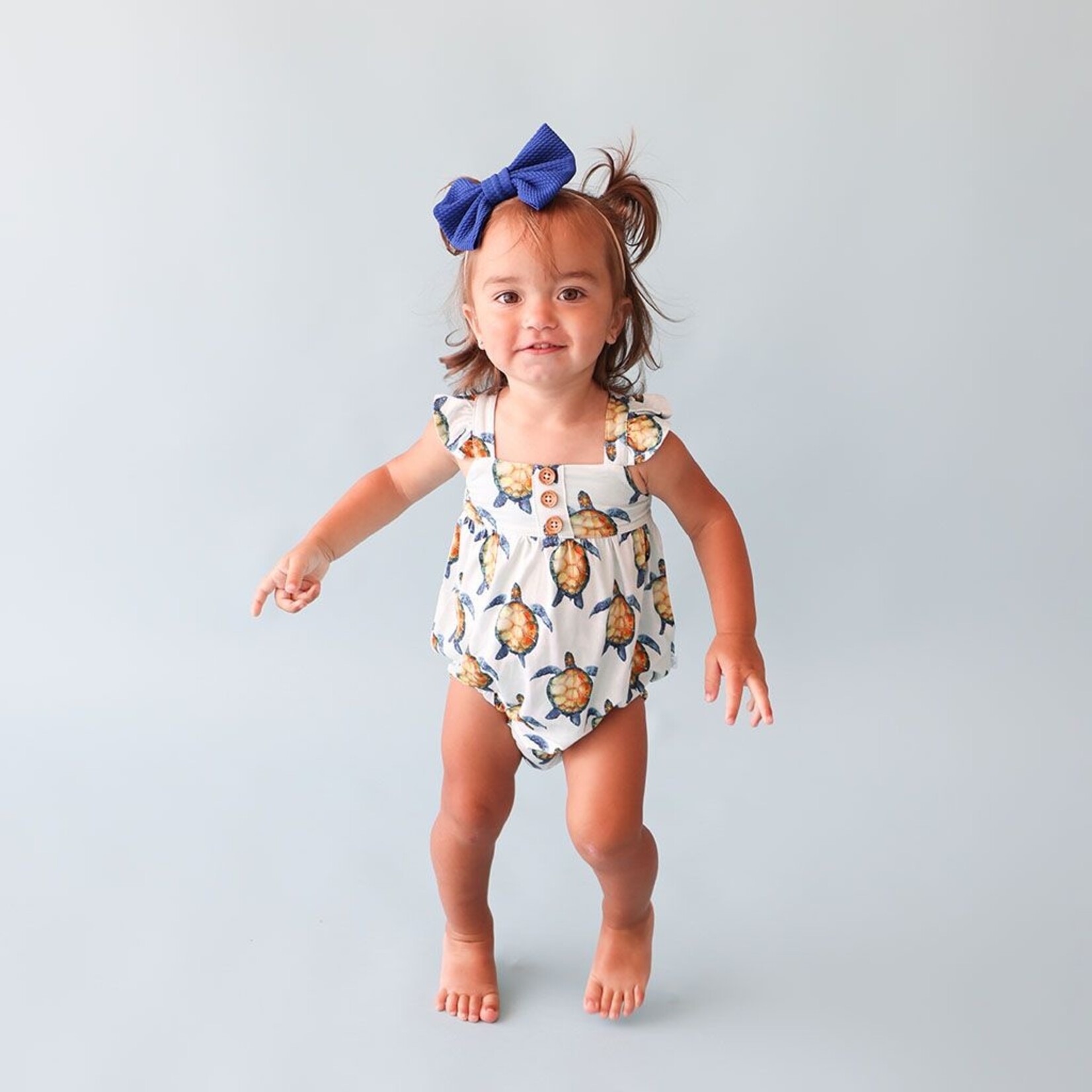 Posh Peanut Cruz - Henley Ruffled Capsleeve Bubble Romper