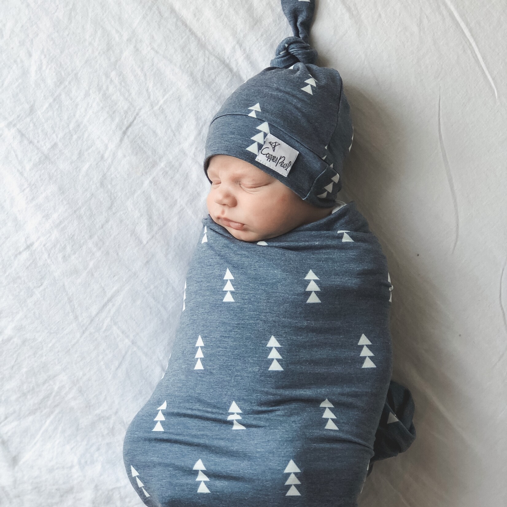 North Top Knot Hat (0-4mo)