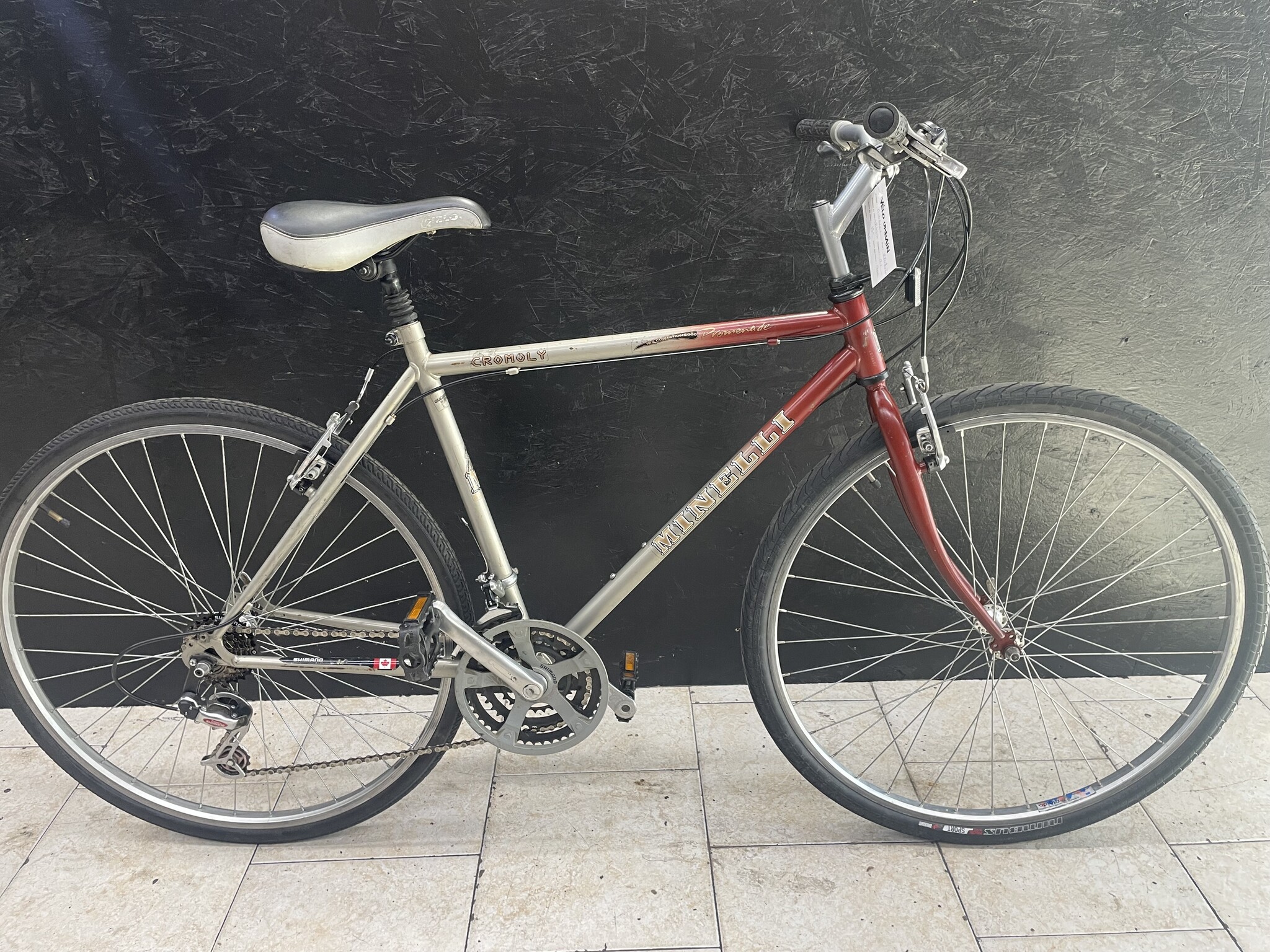 V lo hybride usag Minelli 19 12427 V lo urbain Inc