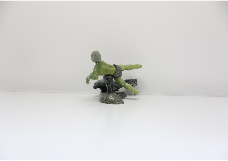 8448 Man swimming with Seal by Isaci Etidloi