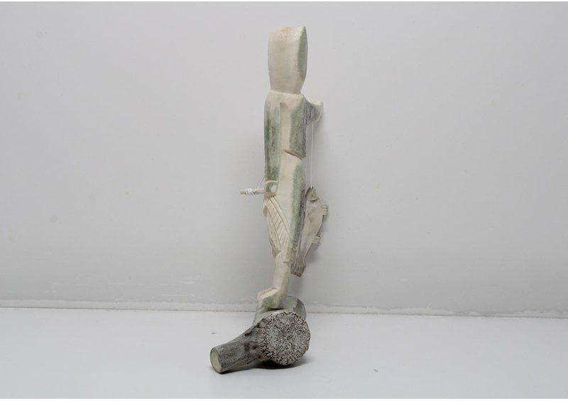 24139 Caribou antler fisher woman by Harry Turqtuq