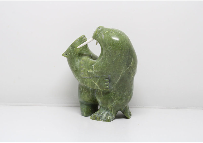 24146 Bear hunts walrus by Napatchie Ashoona