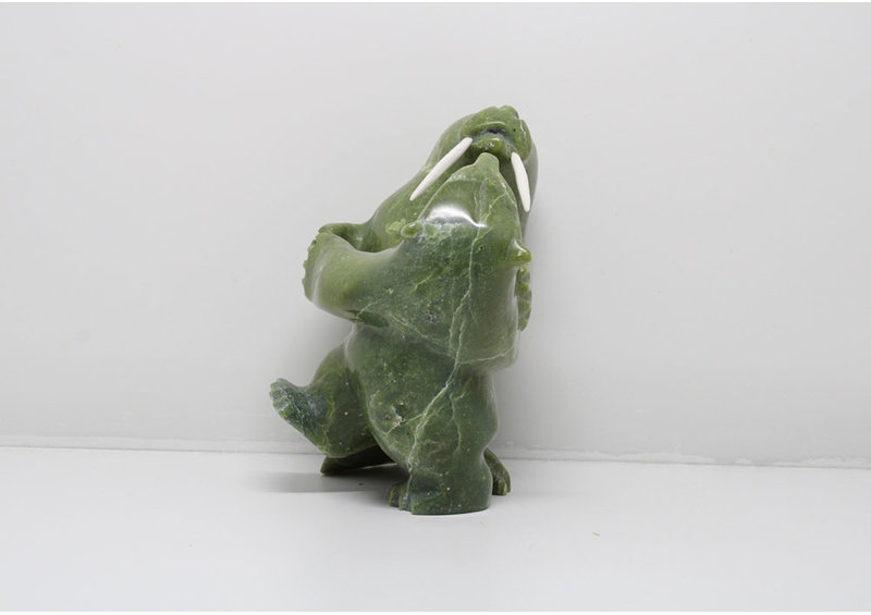 24146 Bear hunts walrus by Napatchie Ashoona