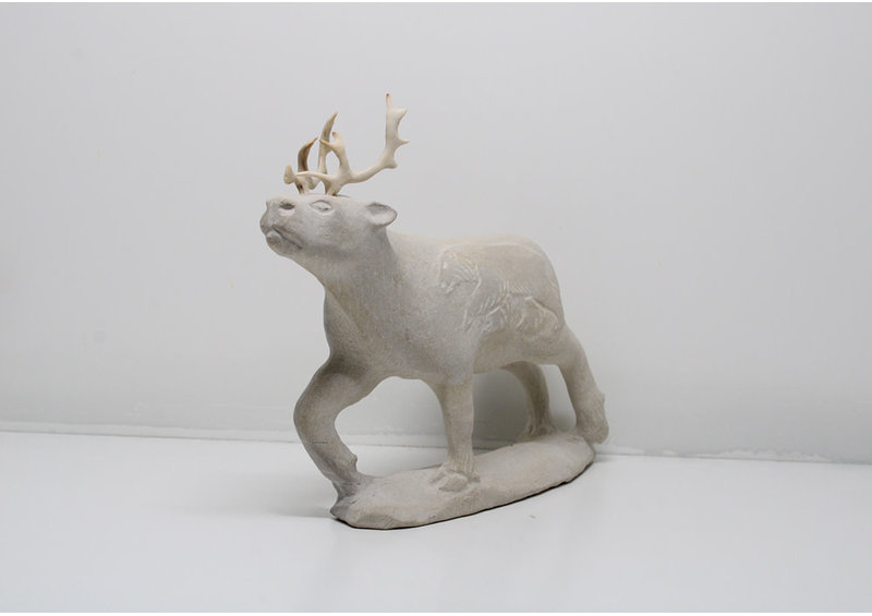 24211 Sandstone etched caribou by Esa Kripanik